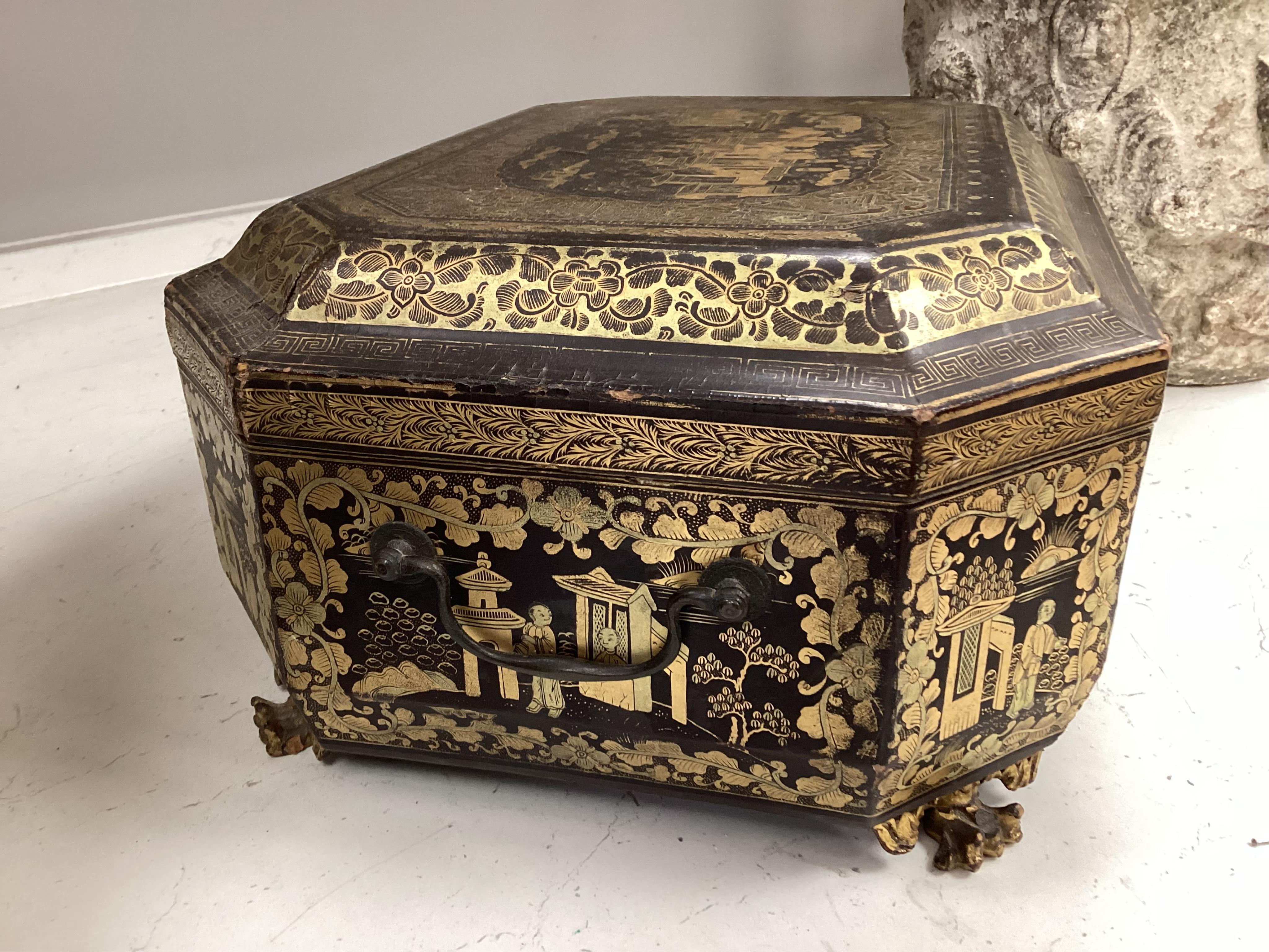 A Chinese export octagonal lacquered work box with fitted interior, 35cm wide
